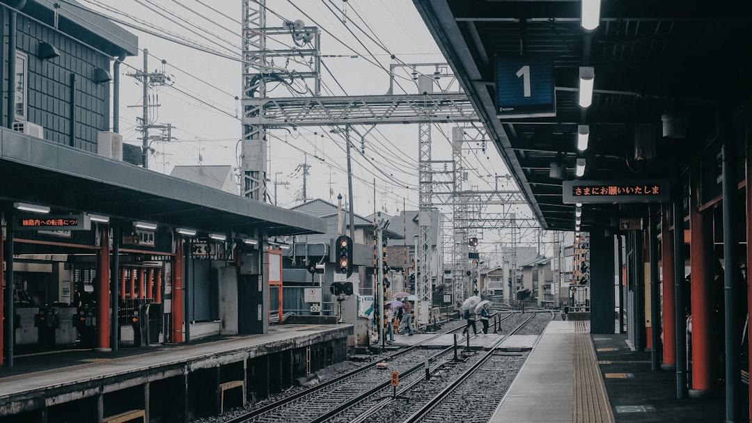 Travelers walking through a Japanese train station