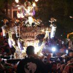 Illuminated Japanese festival float at night